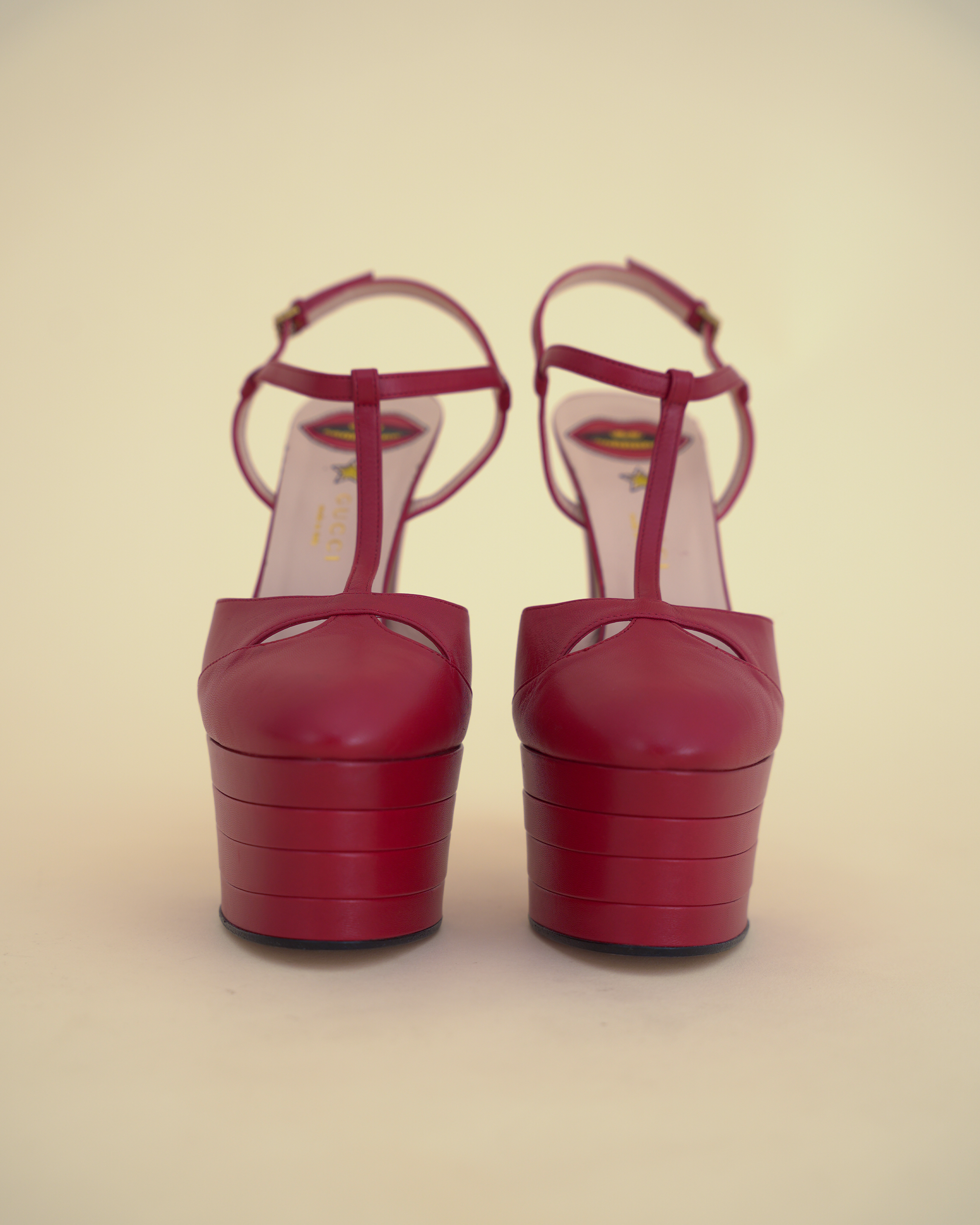 Gucci by Alessandro Michele “Angel” Leather T-Strap Platform Pumps.