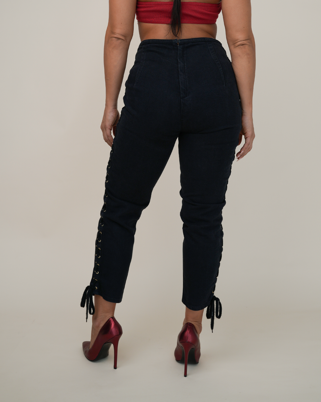Jean Paul Gaultier Corset-Laced Jeans & Buckle Halter-Bra Pairing