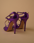 Jimmy Choo metallic purple sandal heels.