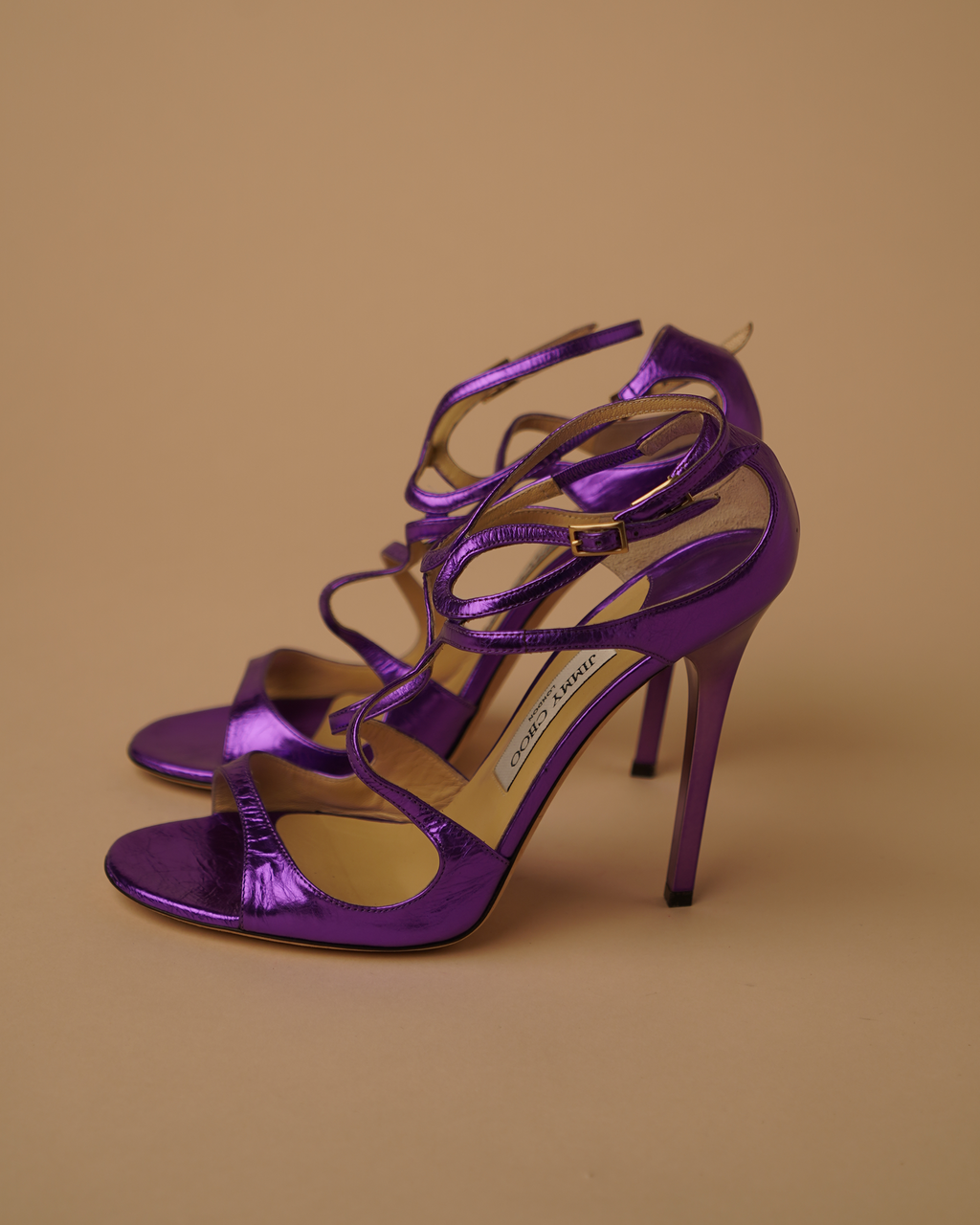 Jimmy Choo metallic purple sandal heels.