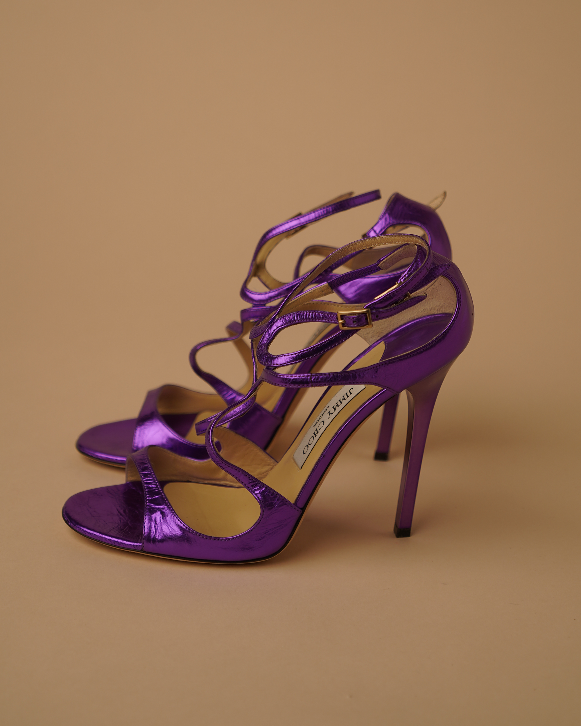 Jimmy Choo metallic purple sandal heels.